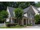 Charming home with landscaped front yard, two-car garage and inviting entryway at 1360 Edmund Ne Ct, Atlanta, GA 30306
