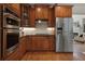 Well-equipped kitchen with stainless steel appliances and custom wood cabinetry at 1360 Edmund Ne Ct, Atlanta, GA 30306