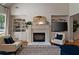 Cozy living room with fireplace, built-ins, and lots of natural light at 1360 Edmund Ne Ct, Atlanta, GA 30306