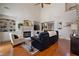 Spacious living room with hardwood floors, fireplace, and built-in shelving at 1360 Edmund Ne Ct, Atlanta, GA 30306