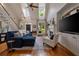 Bright living room with high ceilings, hardwood floors, and elegant furnishings at 1360 Edmund Ne Ct, Atlanta, GA 30306