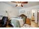 Inviting bedroom featuring a ceiling fan, and light-colored walls at 151 Quail Hollow Dr, Dallas, GA 30157