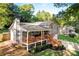 Exterior of home featuring front porch with seating and well maintained landscaping at 151 Quail Hollow Dr, Dallas, GA 30157