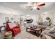 Open-concept living area with kitchen access, hardwood floors, and comfortable seating near dining area at 151 Quail Hollow Dr, Dallas, GA 30157