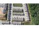 An aerial view of a residential community showcasing the layout, streets, and surrounding landscape at 1637 Short Shadow Ln, Snellville, GA 30078