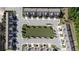An aerial view showcases the community layout with green spaces and orderly street design at 1637 Short Shadow Ln, Snellville, GA 30078