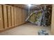 Unfinished basement with exposed framework and utilities, ready to be customized for additional living space at 1637 Short Shadow Ln, Snellville, GA 30078