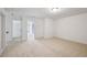 Spacious carpeted bedroom with ensuite bath and lots of natural light at 1637 Short Shadow Ln, Snellville, GA 30078