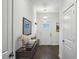 Welcoming entryway with dark wood floors, light walls, and stylish décor creating a modern aesthetic at 1637 Short Shadow Ln, Snellville, GA 30078