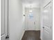 Bright foyer with dark wood floors and white trim at 1637 Short Shadow Ln, Snellville, GA 30078
