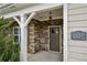 Inviting home entrance showcases stone accents and a stylish front door at 1637 Short Shadow Ln, Snellville, GA 30078