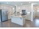 Modern kitchen with stainless appliances, island, and open layout for easy living and entertaining at 1637 Short Shadow Ln, Snellville, GA 30078