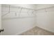 Walk-in closet with wire shelving to maximize storage space at 1637 Short Shadow Ln, Snellville, GA 30078