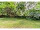 Fenced-in backyard surrounded by a tree line for privacy at 2839 Long Way, Decatur, GA 30032