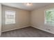 Bedroom with neutral walls and carpet with large windows for natural light at 2839 Long Way, Decatur, GA 30032