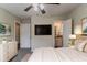Modern bedroom featuring plush bedding, tasteful decor, and an en-suite bathroom at 2839 Long Way, Decatur, GA 30032