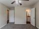 This bedroom features neutral walls, carpeted floors, and ample closet space at 2839 Long Way, Decatur, GA 30032