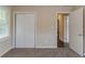 Bedroom with carpet, window, and closet space at 2839 Long Way, Decatur, GA 30032