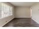 Inviting living room with natural light and stylish, dark wood-look flooring at 2839 Long Way, Decatur, GA 30032