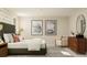 Spacious bedroom with large windows, stylish decor, and ample natural light at 1924 Logan Se Ln, Conyers, GA 30094