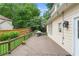 Wooden deck features an outdoor grill, string lights, and a fenced backyard at 200 Creek Run Ct, Alpharetta, GA 30005