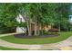Corner lot with a well-maintained lawn and mature trees at 200 Creek Run Ct, Alpharetta, GA 30005