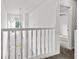 Bright upstairs landing with a view to the foyer below, creating an open and airy feel at 200 Creek Run Ct, Alpharetta, GA 30005