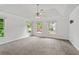 Spacious bedroom with vaulted ceilings, neutral carpet flooring, and lots of natural light at 200 Creek Run Ct, Alpharetta, GA 30005