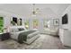 Beautiful bedroom with vaulted ceilings, ceiling fan, carpet flooring, and lots of natural light at 200 Creek Run Ct, Alpharetta, GA 30005