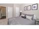 Serene bedroom with elegant decor, soft lighting, and comfortable bed creating an inviting space to unwind at 2720 Garonne Way, Cumming, GA 30041