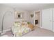 Comfortable bedroom with natural light and neutral decor, ideal for relaxation at 2720 Garonne Way, Cumming, GA 30041