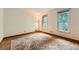 A bedroom featuring hardwood floors and two windows at 2867 Holly Oaks Dr, Marietta, GA 30062