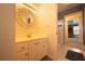Bathroom featuring a vanity, large mirror, and an entrance to a tiled shower/tub at 3071 Intrepid Wake, Marietta, GA 30062