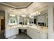 Spacious bathroom boasts double sinks, vanity area, and a large mirror at 3071 Intrepid Wake, Marietta, GA 30062
