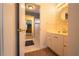 Bathroom with an entrance to another room, featuring a vanity and mirror at 3071 Intrepid Wake, Marietta, GA 30062