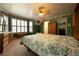 Large bedroom features green walls, carpeted floor, and bay window with shutters at 3071 Intrepid Wake, Marietta, GA 30062