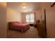 Cozy bedroom furnished with a comfortable bed, dresser, and rocking chair, creating a peaceful personal retreat at 3071 Intrepid Wake, Marietta, GA 30062
