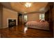 Spacious bedroom with hardwood floors, fireplace, and ample natural light at 3071 Intrepid Wake, Marietta, GA 30062