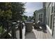 Enjoy outdoor living on this deck, featuring stylish furniture and serene views of the surrounding trees and landscaping at 3071 Intrepid Wake, Marietta, GA 30062