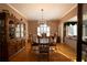 Formal dining room with hardwood floors and decorative chandelier at 3071 Intrepid Wake, Marietta, GA 30062