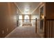 Upstairs hallway with staircase, carpet flooring, and a decorative chandelier at 3071 Intrepid Wake, Marietta, GA 30062
