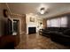 Inviting living room features a cozy fireplace and built-in bookshelves for a warm and inviting ambiance at 3071 Intrepid Wake, Marietta, GA 30062