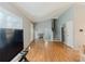 Open concept living area featuring stairs, hardwood floors, and lots of natural light at 4728 Garden Hills Dr, Stone Mountain, GA 30083