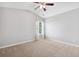 Bedroom featuring carpet, neutral colors, and a ceiling fan at 1220 Roswell Manor Cir, Roswell, GA 30076