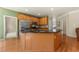 Bright kitchen with a large island, stainless steel appliances and wooden cabinetry at 1995 Settindown Dr, Roswell, GA 30075