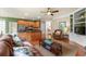 Comfortable living room flows into kitchen; perfect for entertaining with open floor plan at 1995 Settindown Dr, Roswell, GA 30075