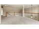 Upstairs loft area featuring fresh carpet and white trim at 1995 Settindown Dr, Roswell, GA 30075