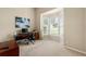 Bright home office with a bay window providing natural light, neutral walls, and comfortable workspace at 1995 Settindown Dr, Roswell, GA 30075