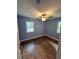 Bright bedroom with hardwood floors, ceiling fan, and large windows offering lots of natural light at 2217 Sargent Se Pl, Atlanta, GA 30315