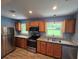 Modern kitchen featuring stainless steel appliances, granite countertops, and beautiful wood cabinets at 2217 Sargent Se Pl, Atlanta, GA 30315